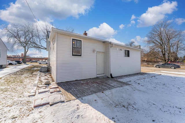 back of property with a patio area