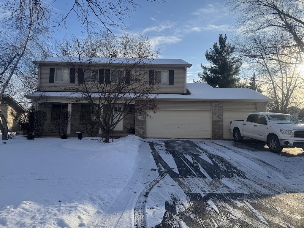 front facade with a garage