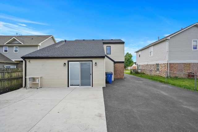 back of house featuring a patio area