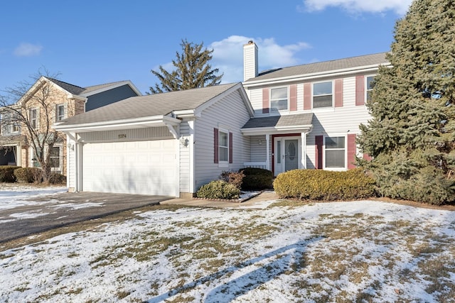 view of front property with a garage