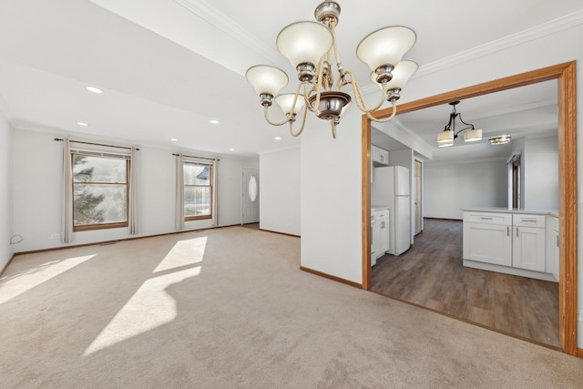 interior space featuring light colored carpet, an inviting chandelier, and ornamental molding