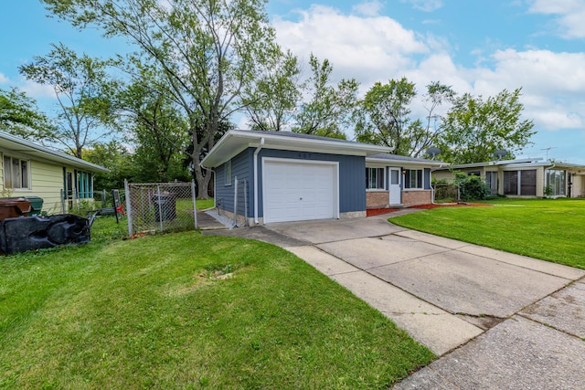 ranch-style home with a front yard and a garage