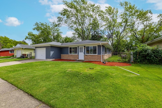 ranch-style house featuring a garage and a front lawn