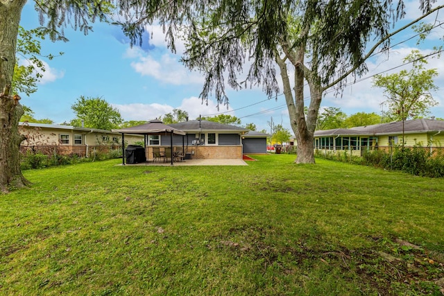 view of yard with a patio area