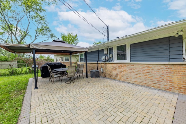 view of patio / terrace featuring a gazebo and grilling area