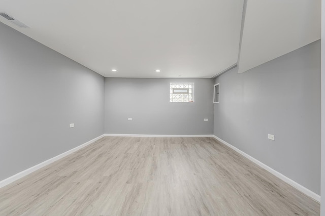 unfurnished room featuring light wood-type flooring