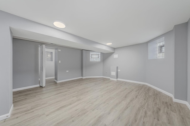 basement with light wood-type flooring