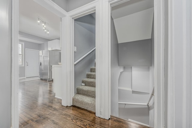 staircase featuring hardwood / wood-style flooring