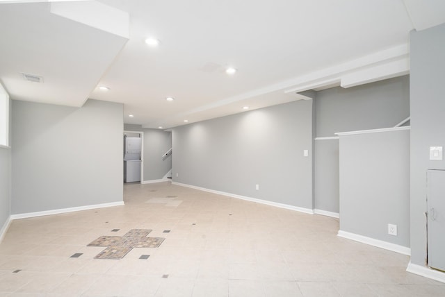 basement featuring light tile patterned flooring