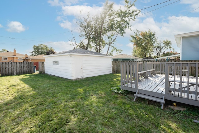 view of yard featuring a shed and a wooden deck