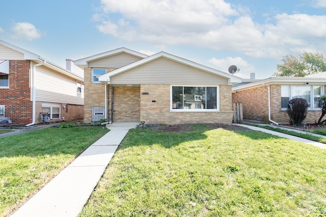 view of front of home featuring a front lawn