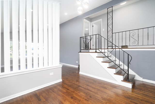 stairway featuring hardwood / wood-style flooring