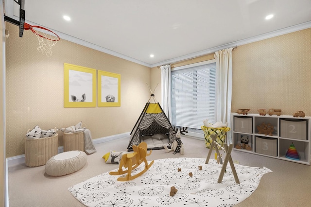 playroom featuring light carpet and crown molding