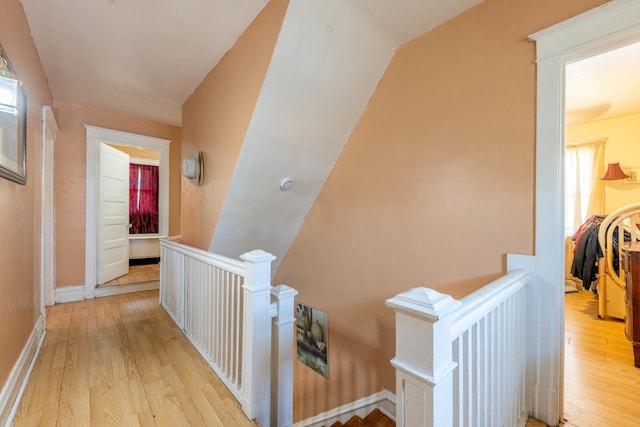 corridor featuring light hardwood / wood-style floors