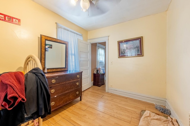 bedroom featuring ceiling fan and light hardwood / wood-style flooring