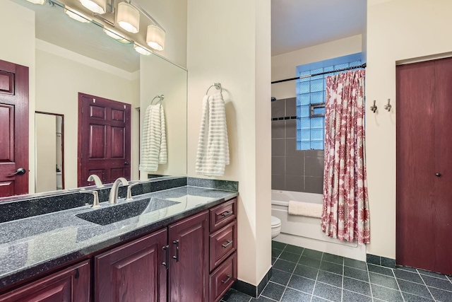 full bathroom with vanity, toilet, and shower / tub combo