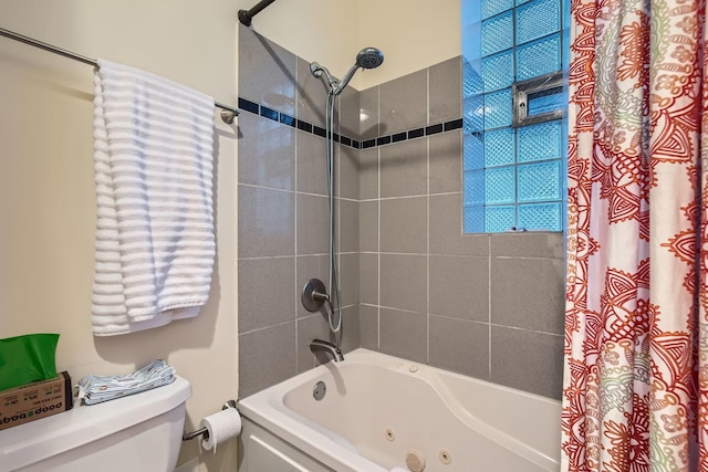 bathroom featuring toilet and shower / tub combo