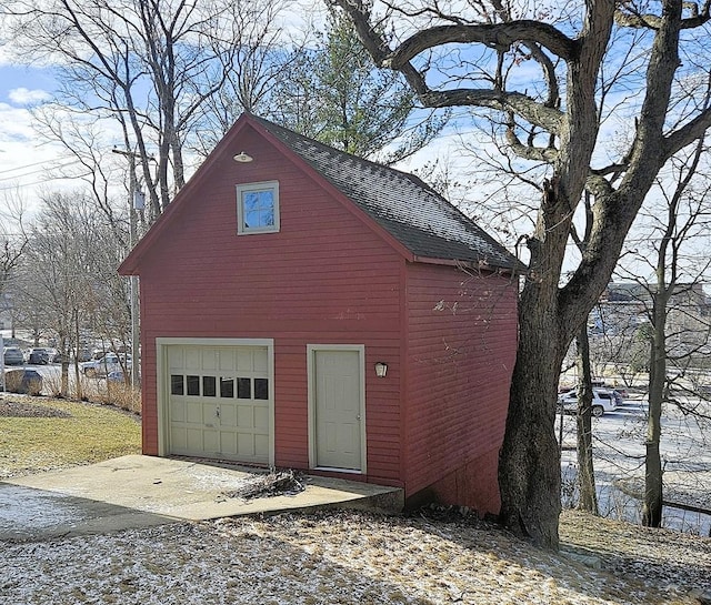 view of snow covered garage