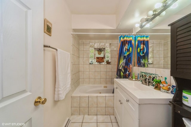 bathroom featuring a combined bath / shower with jetted tub, tasteful backsplash, tile walls, tile patterned flooring, and vanity