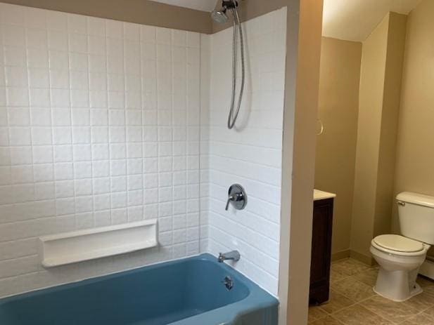 full bathroom featuring toilet, vanity, bathing tub / shower combination, and tile patterned floors