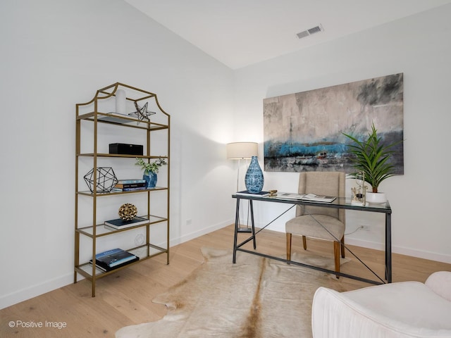 office area featuring hardwood / wood-style floors