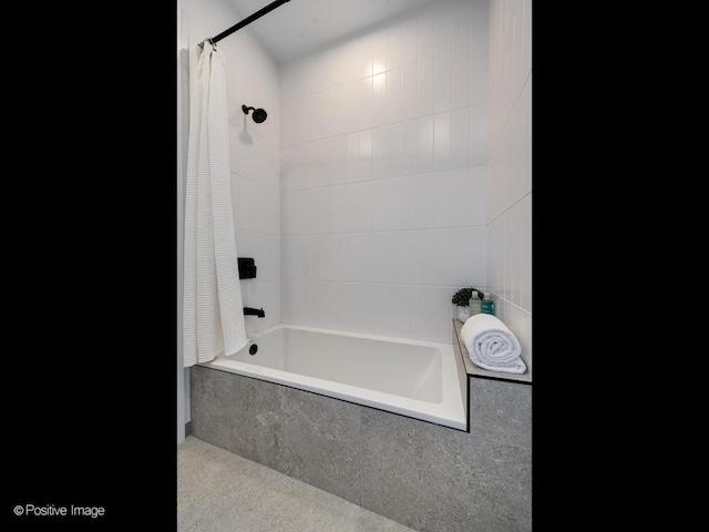 bathroom featuring shower / bath combination with curtain