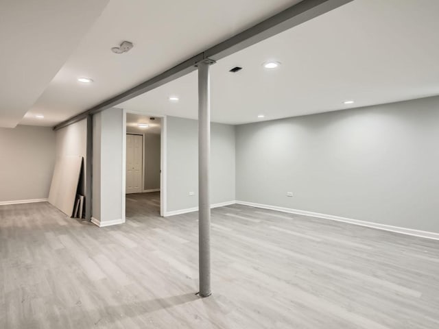 basement with light wood-type flooring