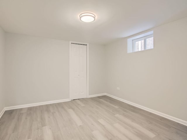 spare room with light hardwood / wood-style floors