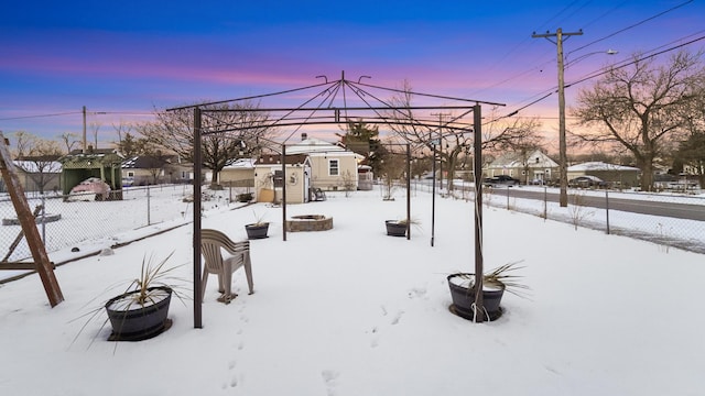 view of yard layered in snow