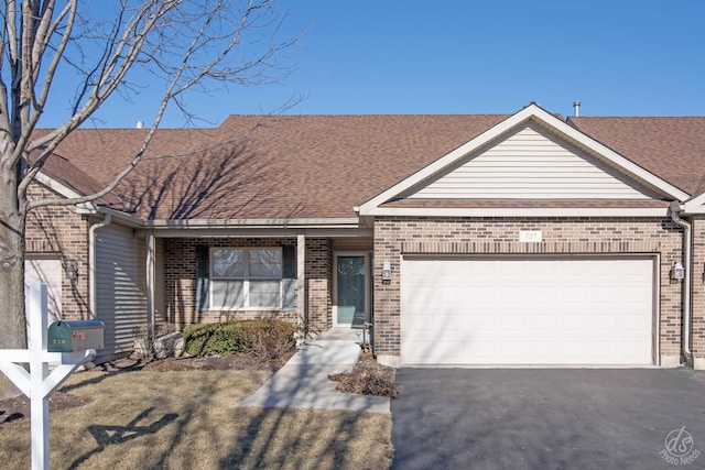 ranch-style home featuring a garage