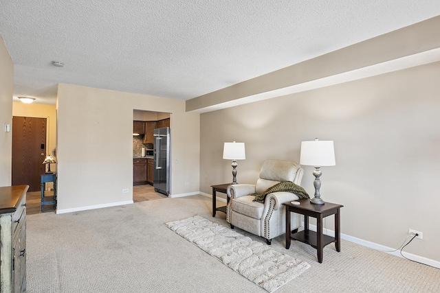 sitting room with light colored carpet