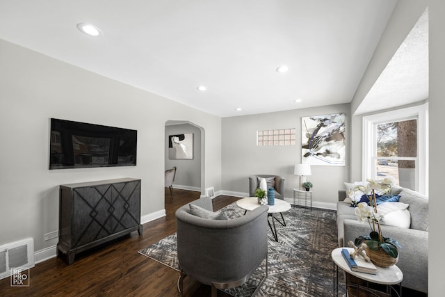 living room featuring dark hardwood / wood-style floors