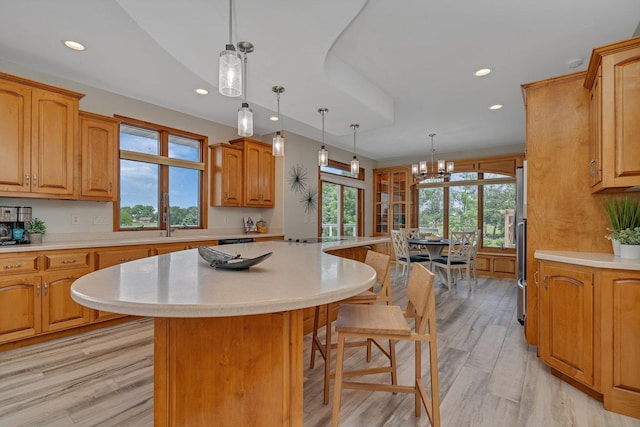 8726 E Goodfarm Rd, Gardner, IL 60424 - kitchen featuring a breakfast bar area, recessed lighting, light countertops, a kitchen island, and a chandelier