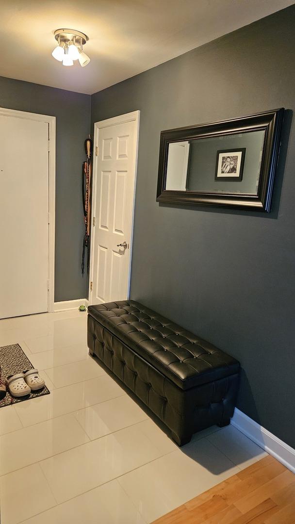 hallway featuring hardwood / wood-style flooring