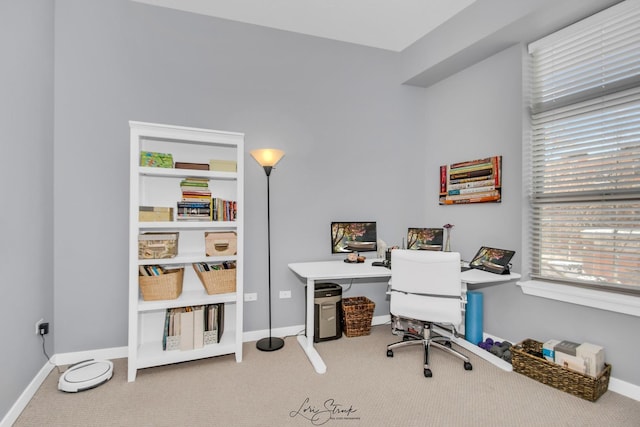 view of carpeted office space