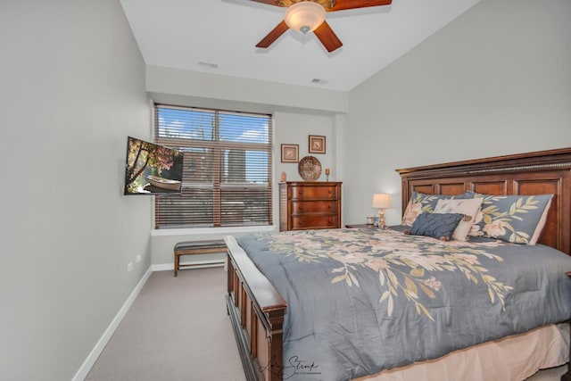 carpeted bedroom featuring ceiling fan and lofted ceiling