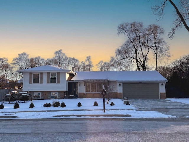 view of front of house with a garage