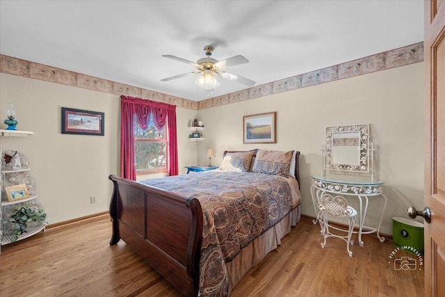 bedroom featuring ceiling fan and light wood-type flooring