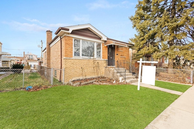 view of front facade with a front yard