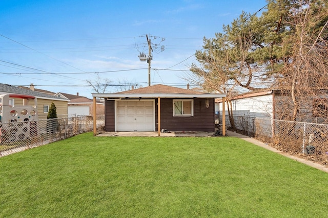 back of property with an outdoor structure, a garage, and a yard