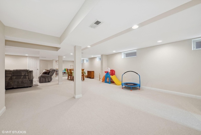 game room with light colored carpet