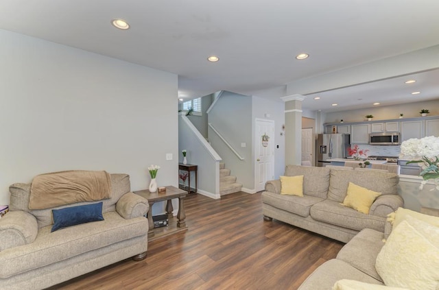 living room featuring dark wood-type flooring