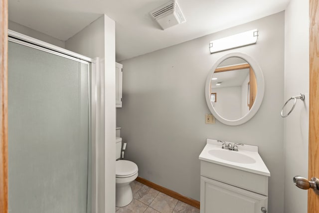 bathroom featuring vanity, an enclosed shower, tile patterned flooring, and toilet