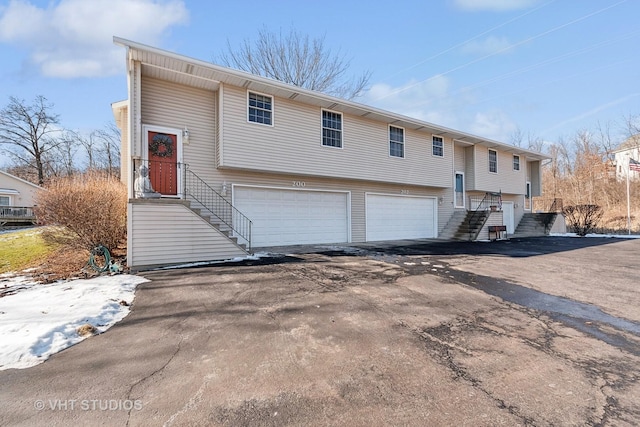 bi-level home featuring a garage