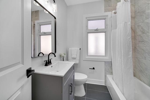 full bathroom featuring tile patterned floors, vanity, toilet, and a healthy amount of sunlight