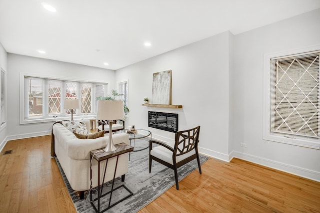 living room with light hardwood / wood-style floors