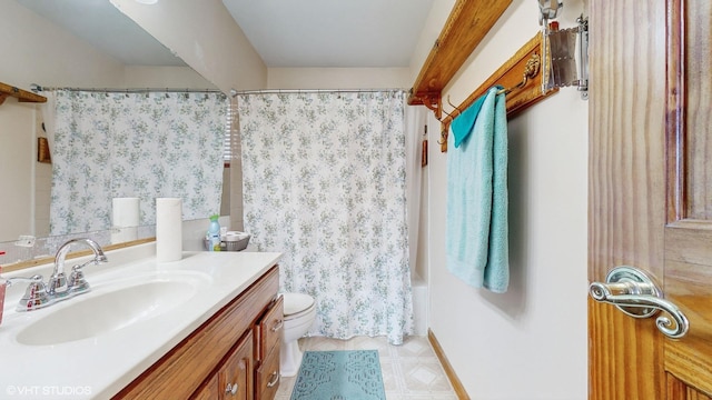 full bathroom featuring shower / bath combination with curtain, vanity, and toilet