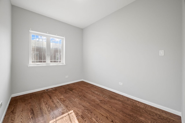 unfurnished room featuring wood-type flooring