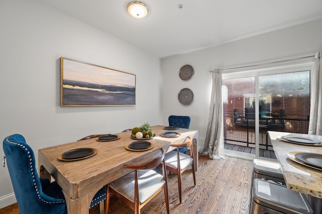 dining room with hardwood / wood-style floors