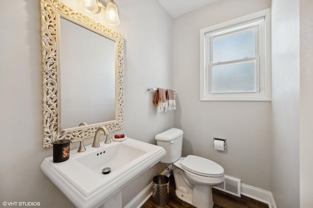 bathroom with toilet and sink